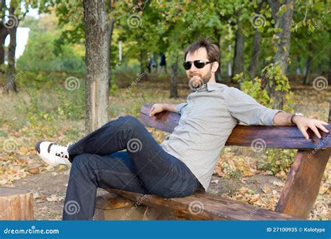 Smiling Man Relaxing On A Park Bench Stock Image Image Of Person
