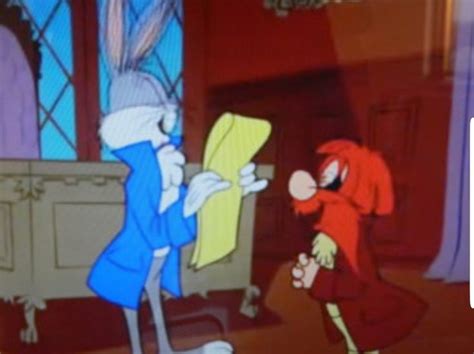An Animated Image Of Bugs And Tails Talking To Each Other In Front Of A