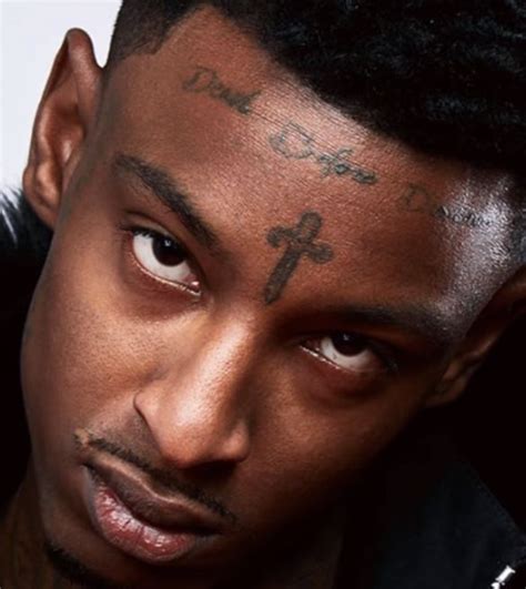 What Does A Tattoo Of A Cross On The Forehead Mean