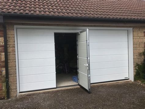 A garage door is a large door on a garage that opens either manually or by an electric motor (a garage door opener). Full Door for Car Access - Dorset Garage Doors