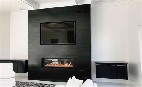 We now have this black wall of stone fireplace which is extremely ugly and masculine. Gorgeous smooth black fireplace stone veneer by Norstone ...