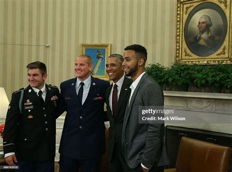 Us President Barack Obama Poses For A Picture With Us Army Specialist
