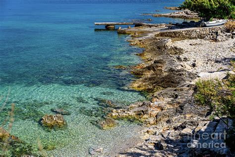 Rocky Beach And Crystal Clear Water On The Dalmatian Coast Trogir