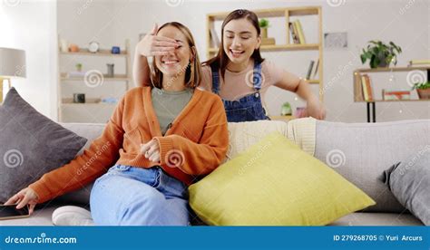 Home Lesbians And Couple With A Surprise Gift And Bonding In Living