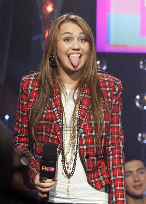 10 Photos That Show Miley Cyrus Has Been Sticking Her Tongue Out For Years J 14 J 14