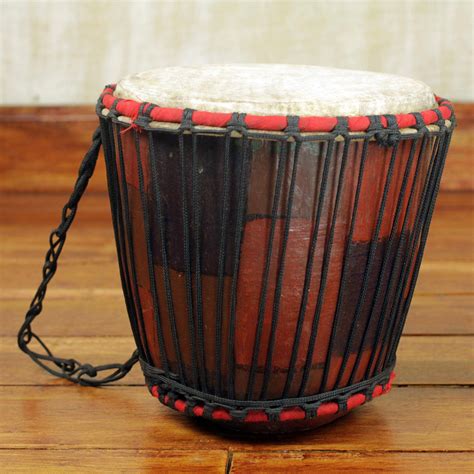 Handcrafted Tweneboa Wood Bongo Drum From Ghana Dramatic Novica