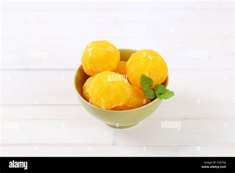Whole And Peeled Oranges Stock Photo Alamy