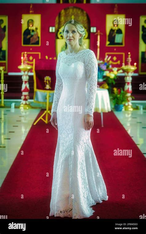 Woman In White Wedding Dress And Amazing Hairstyle On Russian Orthodox