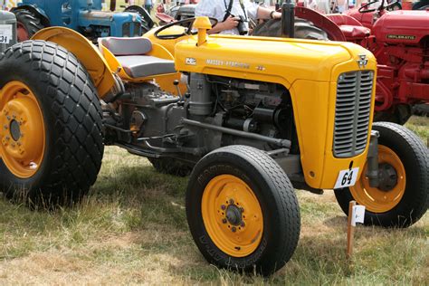 Yellow Massey Ferguson 35 During Melford Hall Vintage Rally In Long