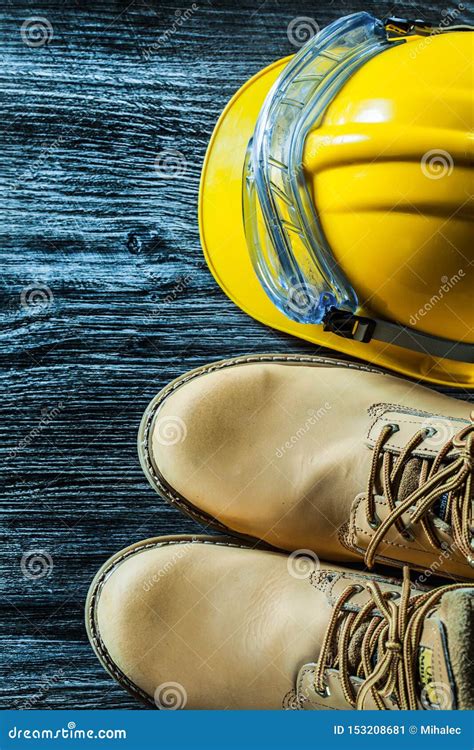 Safety Boots Glasses Building Helmet On Vintage Wooden Board Stock Image Image Of Construction