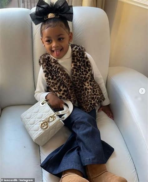 Cardi Bs Daughter Kulture 2 Poses With Her New Dior Handbag In Sweet