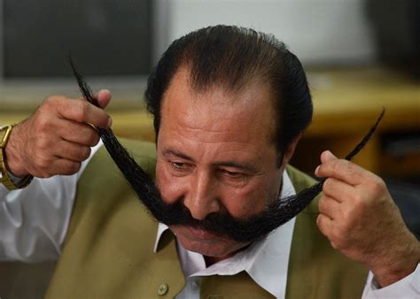 Pakistani Man Dicing With Death For A Moustache Al Arabiya English