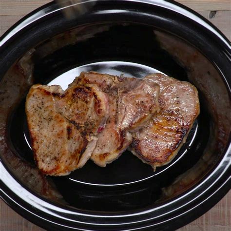 The secret to getting juicy pork chops is lots of seasoning to tenderize the meat while it cooks. Slow Cooker Pork Chops