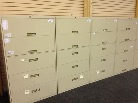 Steelcase 4 drawer silver lateral file with white common top. STEELCASE BEIGE 5 DRAWER LATERAL FILE CABINET