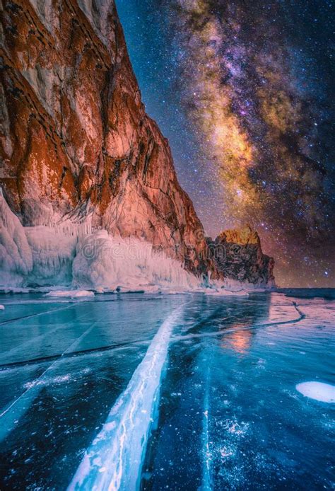 Landscape Of Mountain With Natural Breaking Ice And Milky Way In Frozen