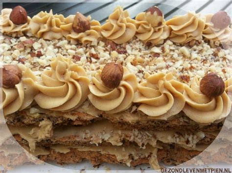 There Is A Cake With Nuts And Icing On It