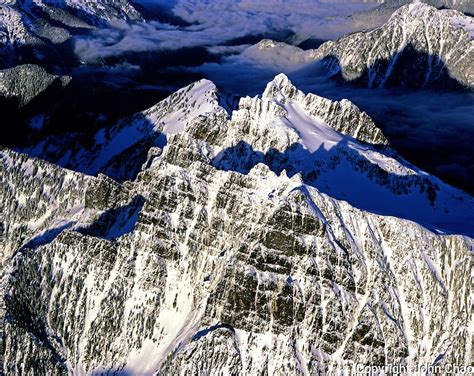 Aerial Of Rugged North Cascades Mountain Peaks In Winter John Chao