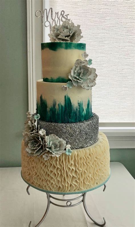 Accent your day with metallic detailing in the way of gold foil invitations, vintage brass candle holders, and hammered flatware on the tables. Teal Buttercream Wedding Cake - CakeCentral.com