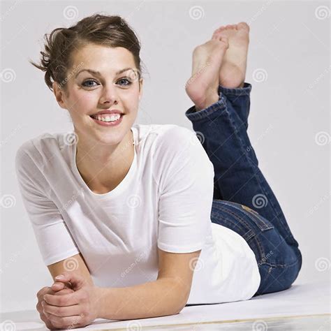 Attractive Woman Lying Down And Smiling Stock Image Image Of
