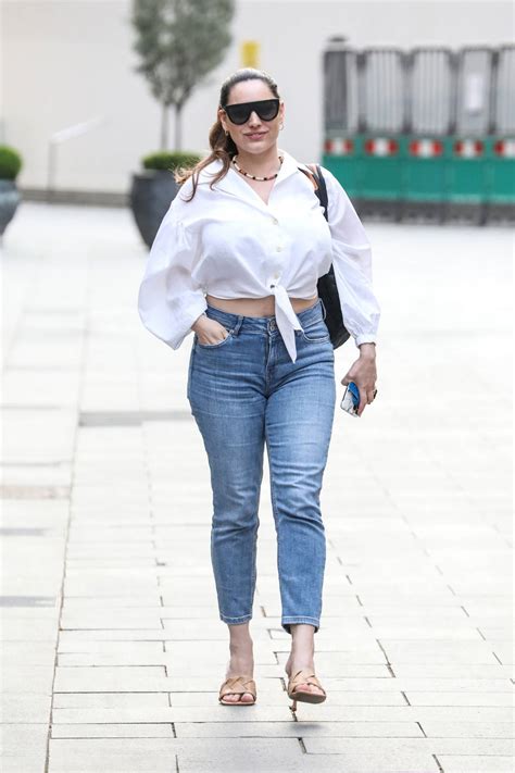Kelly Brook Flashes A Smile And Her Midriff As She Leaves Her Heart Fm Show At The Global Radio