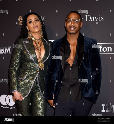 Faith Evans And Stevie J Attending The Recording Academy And Clive