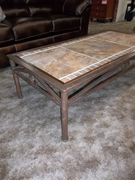 4.3 out of 5 stars with 14 ratings. I Am Saved: Metal, Stone Tile And Walnut Trimmed Coffee Table