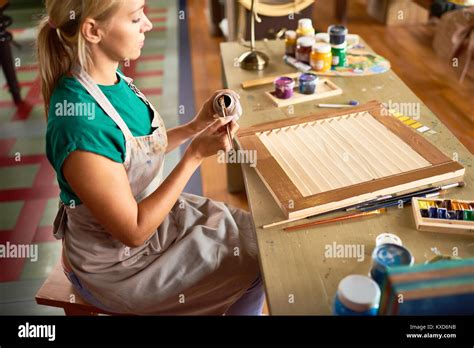 Young Female Artist Working In Studio Stock Photo Alamy