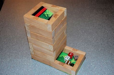 The final challenge for the dice tower was to make the baffles stay in the tower when picked up and to make them extend into the new catchment tray. 10 Free DIY Dice Tower Plans | Make Your Own Dice Tower