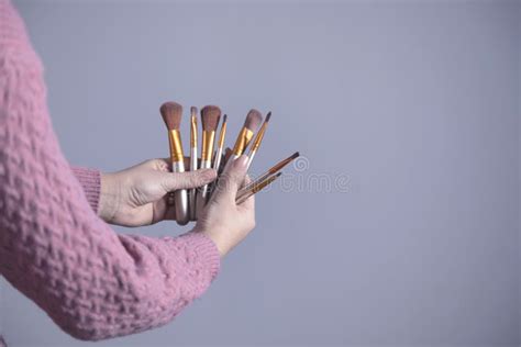 Woman Hand Makeup Brushes Stock Photo Image Of Brush 176657594