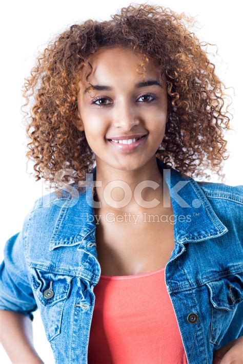 They find them atractive in spite of tier age. Portrait of Pretty African Teenage Girl Smiling; Studio ...