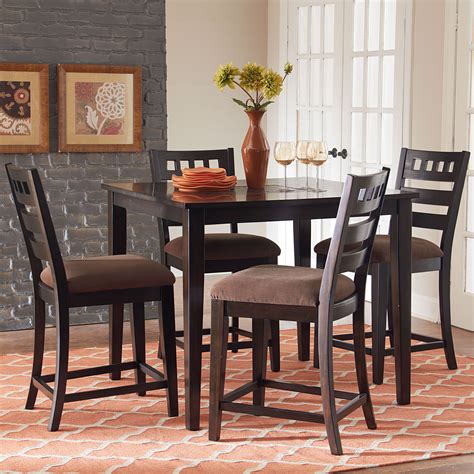 Most people prefer these tables as they are more comfortable to sit around because their feet can easily touch the floor. Standard Furniture Sparkle 5 Piece Counter Height Dining ...
