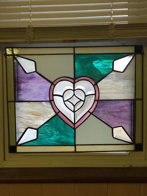And stained glass window and door panes on the lower floor. Bathroom Stained Glass Window | Stained glass art, Stained glass mosaic, Stain glass cross