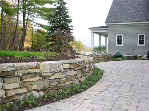 A retaining wall is a structure that keeps soil, rock and water in place so that it won't be washed away from the rain. Retaining Wall Design - Landscaping Network