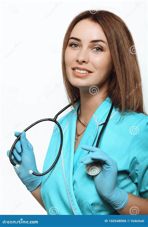 Girl Doctor Pulls A Rubber Glove Royalty Free Stock Image