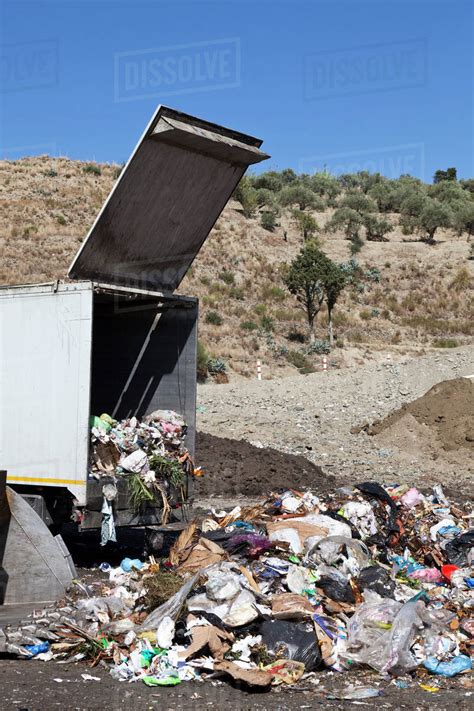 Truck Dumping Refuse Into Landfill Stock Photo Dissolve