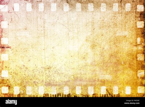 Vintage Sepia Film Strip Frame On Old And Damaged Paper Background