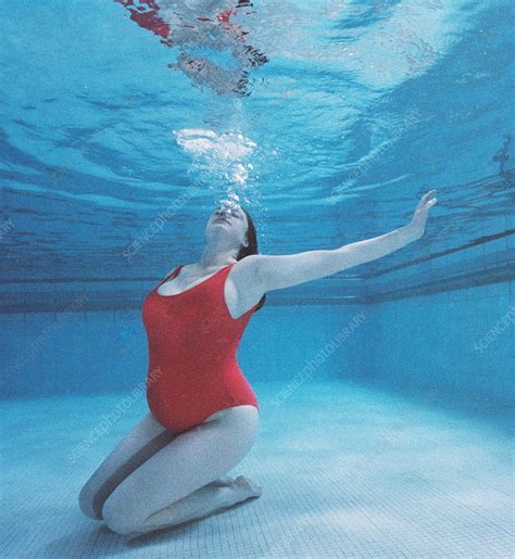 Pregnant Woman In A Swimming Pool Stock Image M Science