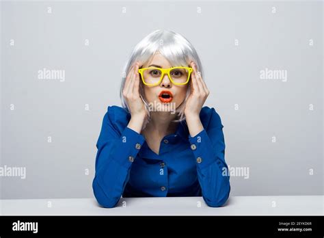 Woman In Yellow Glasses Holds Hands On Face Emotions Red Lips Isolated