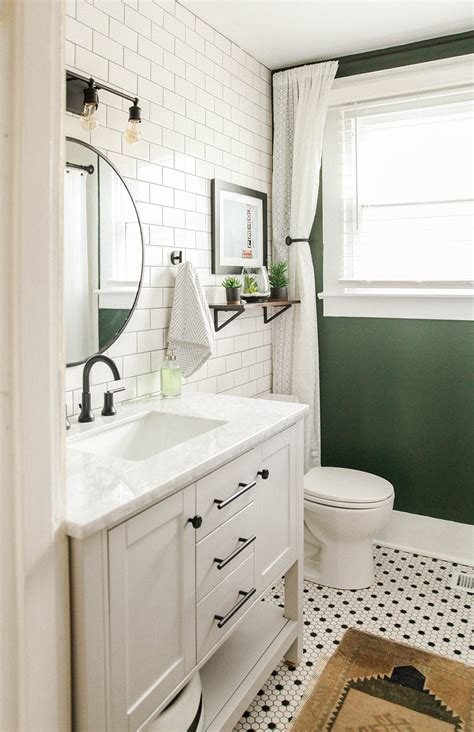 Sure, it may not offer the room the warm glow that other colors such as beige, brown, or the natural color of the wood do, but the simplicity of the combination creates a classic, timeless and peaceful look, which is exactly what the. touch of green - black and white - bathroom - nashville ...
