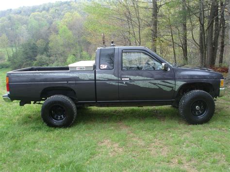 GREY NISSAN HARDBODY KING CAB X BOUGHT THIS DURING MY MILITARY