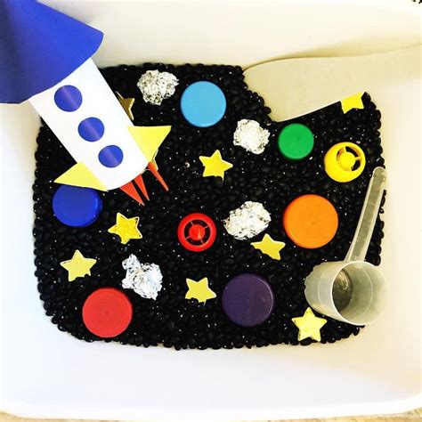 Outer Space Sensory Bin 🚀 Base Is Dried Black Beans Recycled Bottle