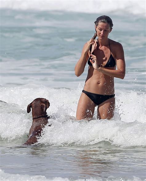 Gisele Bundchen In A Bikini On The Beach With Her Sister Gabriela In