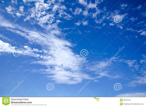 Wonderful Blue Sky With Some White Clouds Stock Photo