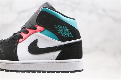 A turbo green leather upper is seen with white on the toe box and quarter panels. 2020 Jordan 1 Mid SE South Beach White Black Tiffany ...