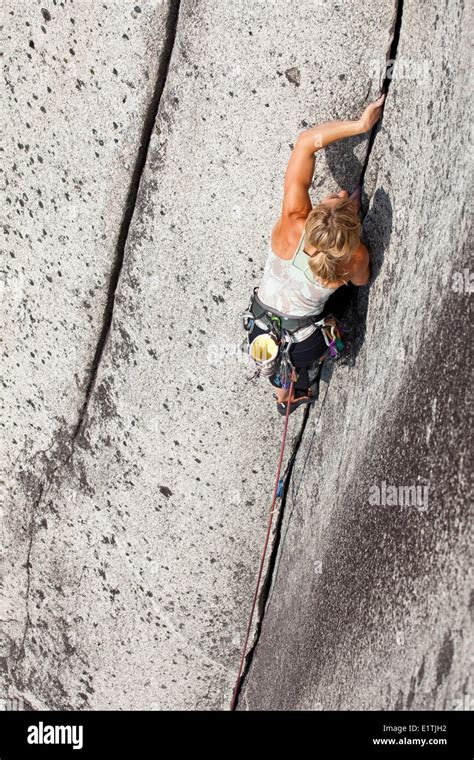 A Strong Female Climber Climbing Crescent Crack 10d Squamish Bc Stock