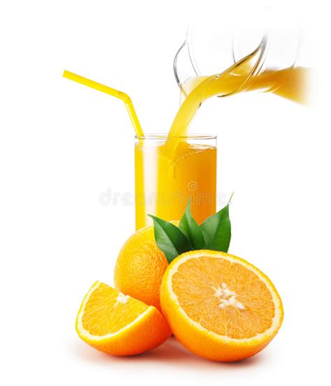 Orange Juice Pouring Into A Glass And Oranges Stock Photo Image Of
