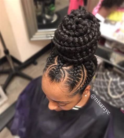 These double dutch braids make any messy bun, topknot or low bun, look awesome. Cute 10 Buns With Braiding Hair | New Natural Hairstyles