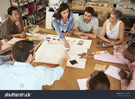 Female Boss Leading Meeting Architects Sitting Stock Photo Edit Now