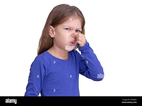 Child Kid Holding Fingers On Nose Showing That Bad Smell Isolated On