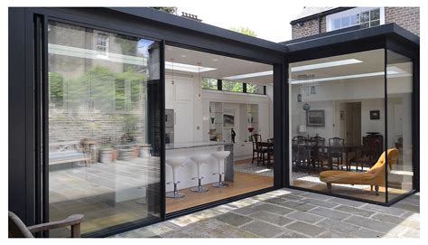 Glass extension #glass #extension #bungalow An L-shaped glass extension to the rear of a period ...